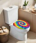 Elongated Tie Dye Aquarelle Print Tie Dye Spiral Rainbow Toilet Seat on a white toilet in a bright bathroom.