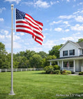 Top Notch 1.5 Inch Flag Pole Rings With Anti Wrap Swivel Clips And 360 Degree Rotating Aluminum Alloy Mounting Hardware For Rad Tangle Free Flag Flying With Rust Resistant Carabiners Two Pack, flag waving in outdoor setting.