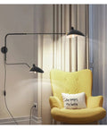 Slick Adjustable Double Head Wall Sconce Lamp In Modern Black Finish With Swivel Pole Design For Cozy Bedroom Reading Vibes.