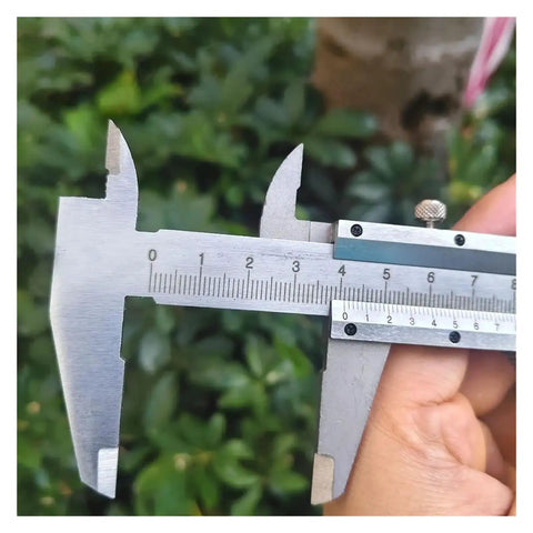 All In One Pro Grade Stainless Steel Caliper Set With Vernier And Digital Readouts Four Use Gauge close-up measurement view