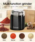200W Electric Herb Grinder With Stainless Steel Blade, Compact Black Spice Grinder for herbs and spices on kitchen counter.