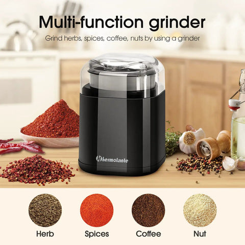 200W Electric Herb Grinder With Stainless Steel Blade, Compact Black Spice Grinder for herbs and spices on kitchen counter.
