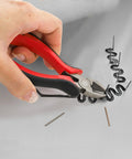 Using pliers on Three Thousand Pieces Plastic Welder Staples Kit With Storage Box 0.6mm And 0.8mm Flat Wave Staples for car repairs