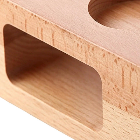Close-up of the Premium Hardwood Espresso Tamping Station For 58mm Filters showcasing the solid beech wood finish and cutout detail.