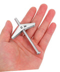 32 Piece Toggle Bolts Wing Nut Kit Heavy Duty Metal Drywall Anchors And Assorted Screws For Securely Hanging Heavy Items On Walls Easy Installation And Strong Hold, silver toggle bolt in hand