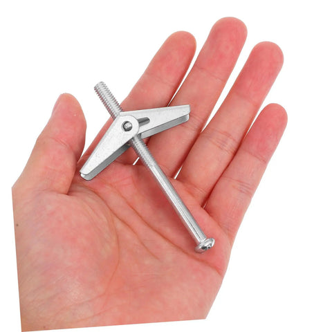 32 Piece Toggle Bolts Wing Nut Kit Heavy Duty Metal Drywall Anchors And Assorted Screws For Securely Hanging Heavy Items On Walls Easy Installation And Strong Hold, silver toggle bolt in hand