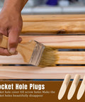 Applying finish to wooden boards using 300 pack solid wood pocket hole plugs for pocket hole jig, pine wood plugs for DIY woodworking.