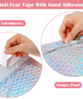Hands sealing 60 Pack Holographic Bubble Mailers Dope Waterproof Self Seal Foil Glitter Glamour Shipping Envelopes