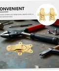Chic 2pcs Retro Golden Duckbill Toggle Latches Fit Any Wooden Chest Or Toolbox With Stunning Zinc Alloy Finish For Vintage Decor And Secure Fastening, gold zinc alloy clasp on workbench
