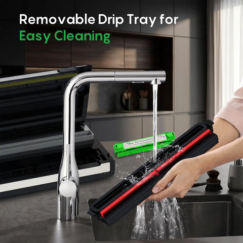 Automatic Vacuum Sealer For Food With Hands Free Operation And Built In Cutter And Roll Storage being cleaned under running water