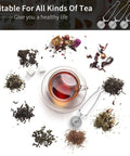 Stainless Steel Tea Infuser Ball Strainer With Handle 3 Pack Ultra Fine Mesh Filter beside a cup of tea and loose leaf tea varieties.