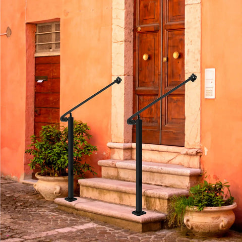 Heavy Duty Adjustable Stair Handrail Rock Solid Wall And Floor Mounted Wrought Iron Safety Rail Built Tough For One To Three Steps No Sweat Installation In Matte Black Steel near a door with stone steps.