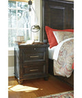 Industrial Glass Pendant Light With Clear Shade In Gray Finish in cozy bedroom setting.