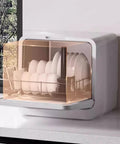 Skip The Sink Blues With This Plug And Play Countertop Dishwasher Featuring Heavy Duty High Temp Cycle Triple Wash Filters And Zero Hassle Install For Crisp Clean Loads Every Single Time on a kitchen countertop.