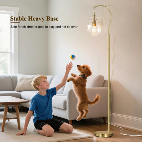 Boy playing with dog near Gold Modern Floor Lamp With Globe Glass Shade, 68 Inch Tall Mid Century Standing Lamp For Living Room And Bedroom