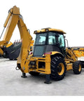 4WD Backhoe Loader With 2.4m Digging Depth, tractor loader digger showing cabin and rear attachments on jobsite