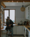 Cozy kitchen with Indoor 2 Pack G50 LED String Lights with Vintage Filament Bulbs, shatterproof design, enhancing atmosphere.
