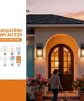 Dusk To Dawn Outdoor Wall Light With Automatic Sensor Solid Black Metal Coach Lantern Waterproof Porch Fixture illuminating a front porch.
