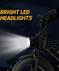 Beast Mode Electric Fat Tire Mountain Bike With LED headlights illuminating dark trail