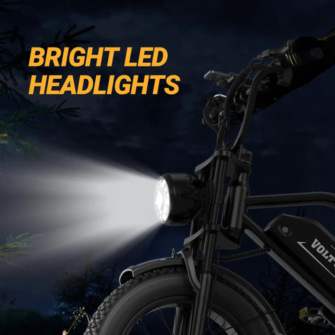 Beast Mode Electric Fat Tire Mountain Bike With LED headlights illuminating dark trail