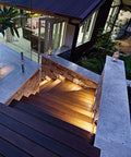 Illuminated stairs with Low Voltage IP65 Waterproof Half Moon LED Step Lights for decks and pathways, enhancing yard ambience.