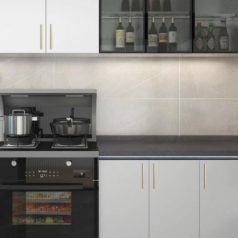 Kitchen scene with white cabinets featuring 30 Pack 5 Inch Brushed Gold Cabinet Pulls Zinc Alloy Drawer Handles for a modern look