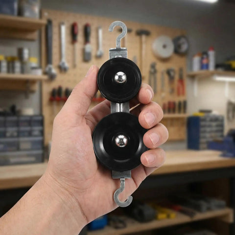 Hands On Ten Piece Mechanics Pulley Block Set With Heavy Duty Metal Fixed And Movable Pulleys Ropes Hooks Transparent Storage Case STEM Physics Lab Kit For Teaching Simple Machines In Classrooms Or Home Labs, close-up hand-held pulley