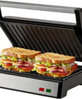 Get Juiced With This Bad Boy 1200W Panini Press Grill Standard 2 Slice Sandwich Maker cooking two grilled sandwiches on non-stick plates.