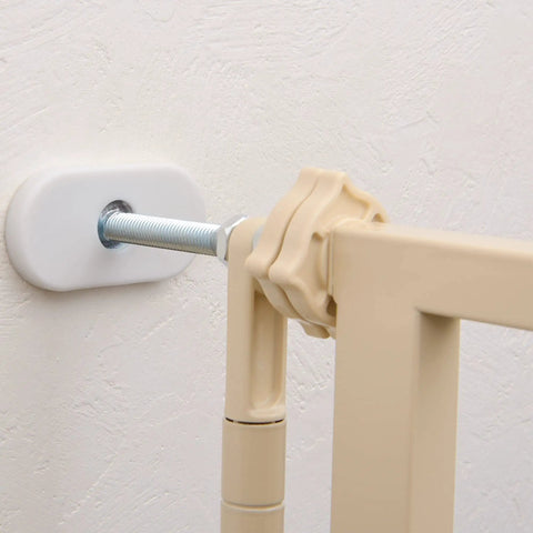 Tough As Nails Extra Tall Cat Gate Heavy Duty Steel Barrier With Foolproof Paw Lock secure mounting detail in beige close-up.