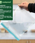 24 Pack Reusable Food Storage Bags Dishwasher Safe Microwave Safe BPA Free Freezer Bags for Easy Meal Prep, shown held by hand