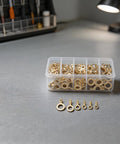 Top Grade 150 Pcs Brass Ring Cable Lug Terminal Kit With M3 To M10 Sizes For Solid Bare Copper Wire Crimping And Easy Home Auto Wiring Projects Inside Neat Clear Storage Box on desk