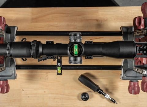 Pro Grade Dual Bubble Scope Leveling Kit For Foolproof Reticle Alignment installed on a rifle scope for elevation adjustment.
