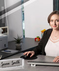 Clear Acrylic Display Blocks Set With 4 Blank Name Plates on a desk, customizable and scratch-resistant, ideal for office use.