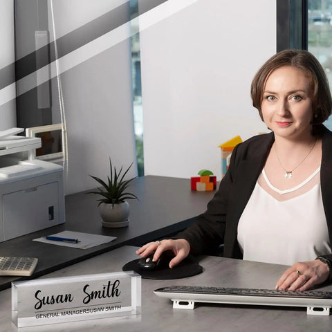 Clear Acrylic Display Blocks Set With 4 Blank Name Plates on a desk, customizable and scratch-resistant, ideal for office use.