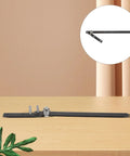Heavy Duty Manual Rebar Bender Steel Hand Pipe Bending Machine For Construction Sites on wooden table with green leaves nearby