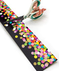 Cutting Colorful Confetti On Black Border Trim Roll 50 Foot to Liven Up Classroom Decor with Scissors