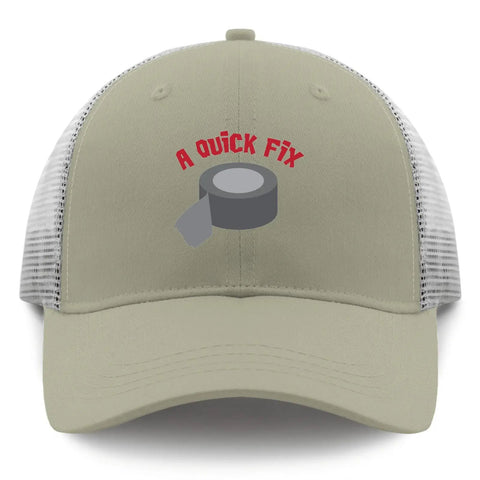 Front view of green mesh baseball cap with "A Quick Fix" text and duct tape graphic, ideal for casual wear.