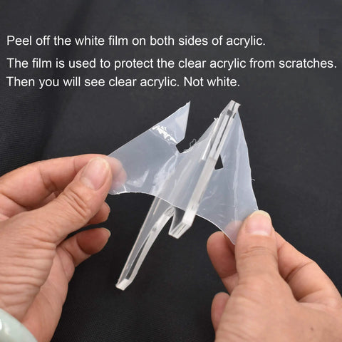 Hands peeling film from Clear Lightsaber Wall Mount And Holder With Clip Hardware Included Minimalist See Through Blade Display.