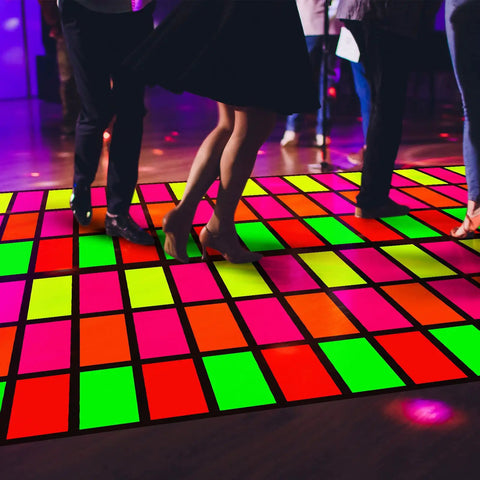 People dancing on Disposable Neon Dance Floor Carpet Runner For Outdoor Parties And Weddings 118 By 39 Inches 80s 90s Party Decor