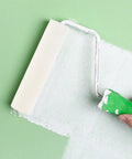 Applying paint with Polyurethane Sponge Paint Roller Set High Density for Walls and Detail Work Offering No Drip Performance.