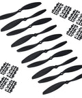 RC Propeller Set Nine By Four Point Seven Inch Two Blade FPV Propellers For Fixed Wing Aircraft, black with adapter rings displayed
