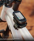 Top Tube MTB Mount For Mountain Bikes with GPS computer attached, showing Garmin display, mounted on white bike frame