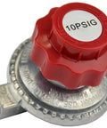 Close-up of propane regulator with red knurled knob, metal body, 0-10 psi adjustable.