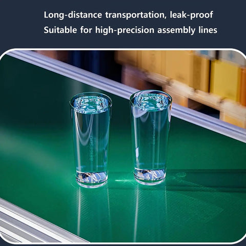 LED Small Conveyor Cargo Lane With Optical Inspection, 170 By 300mm Food Grade Belt, Stepless Speed Control, 22 Lbs Load, All Aluminum Body with two glasses on a green conveyor.
