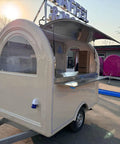 Kickstart Your Mobile Eatery Hustle With This Custom Food Vending Trailer And Commercial Catering Cart showing the exterior view with an arched design.