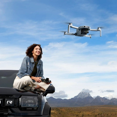 Woman operating Ultra Lightweight Drone Under 249g With 4K Video And 8K Photos 3 Axis Gimbal 10 Km Transmission AI Track
