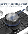 Top Shelf Silicone Spatula Set Five Piece Kit Heat Resistant Up To Six Hundred Degrees Seamless Handle stirring a boiling pot.