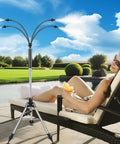 Outdoor Patio Water Mister System 26.5 Feet Portable Cooling Mister With Adjustable Height Stand near a poolside chair.