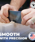 Top Shelf High Carbon Steel Rectangle Card Scraper Set Delivering Knockout Performance On Fine Woodworking Projects Hella Smooth Glue Scraping Blade Handcrafted For Masterful Finishing Jobs Made In Usa, shown in use on wood.