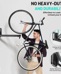 Man mounting bike on Bike Rack Wall Mount For Garage And Indoor Use, Space Saving Vertical Holder Up To 77 Lbs